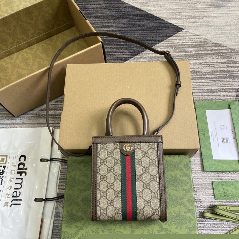 G*u*i top handle bags